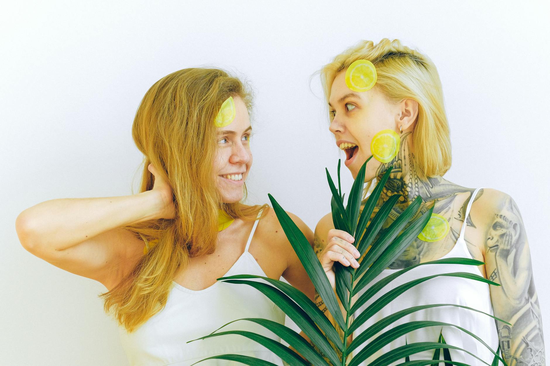 Two people smiling together, expressing openness and connection in conversation